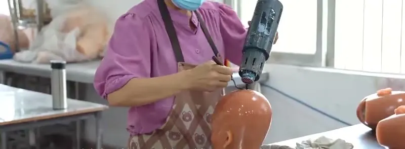 Aifei factory, head finishing, still from our factory video